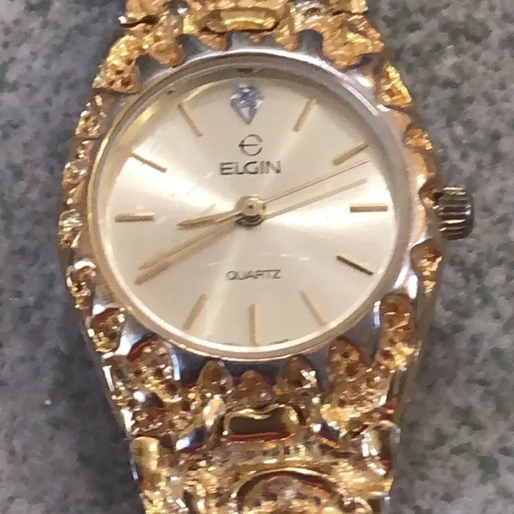 Vintage Elgin Gold nugget ladies watch.